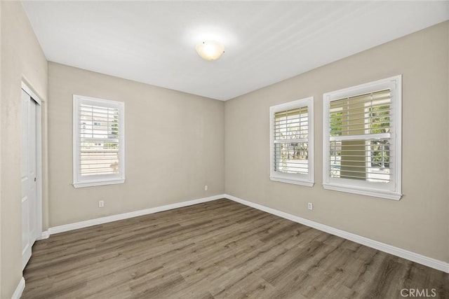 6792 Vanderbilt St, Chino, CA 91710 - unfurnished bedroom featuring wood finished floors and a closet