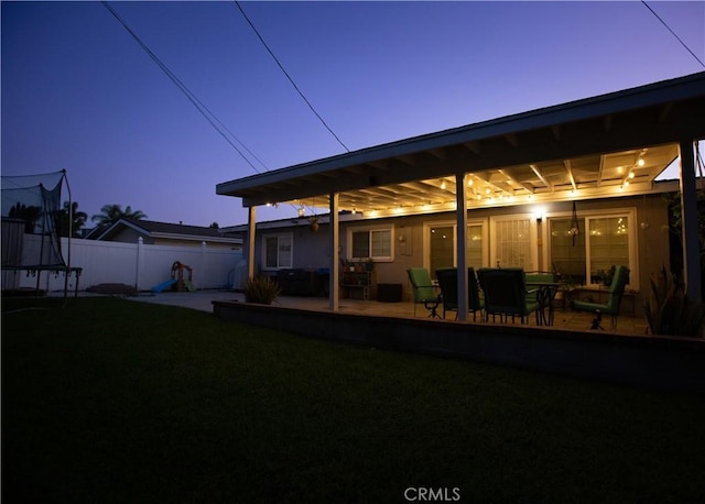 750 Durham St, La Habra, CA 90631 - rear view of property featuring a trampoline and a patio area