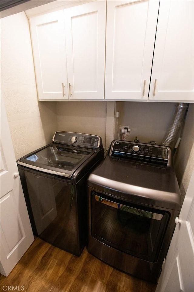750 Durham St, La Habra, CA 90631 - laundry area with washer and clothes dryer, dark wood-style flooring, and cabinet space