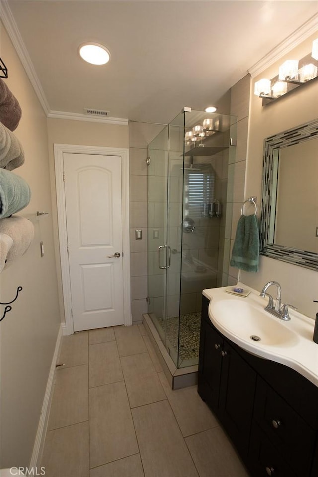 750 Durham St, La Habra, CA 90631 - bathroom featuring vanity, a stall shower, tile patterned floors, and crown molding