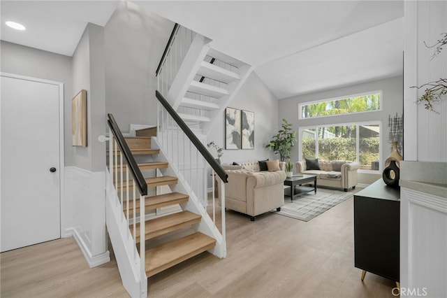 6923 Lamar Ct, Rancho Cucamonga, CA 91701 - staircase with wood finished floors and lofted ceiling