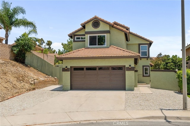 6923 Lamar Ct, Rancho Cucamonga, CA 91701 - mediterranean / spanish-style house with driveway, stucco siding, and a tiled roof