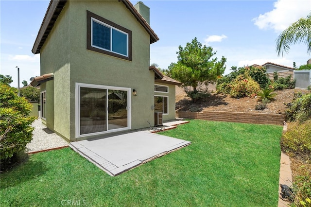 6923 Lamar Ct, Rancho Cucamonga, CA 91701 - back of house with stucco siding and a patio area