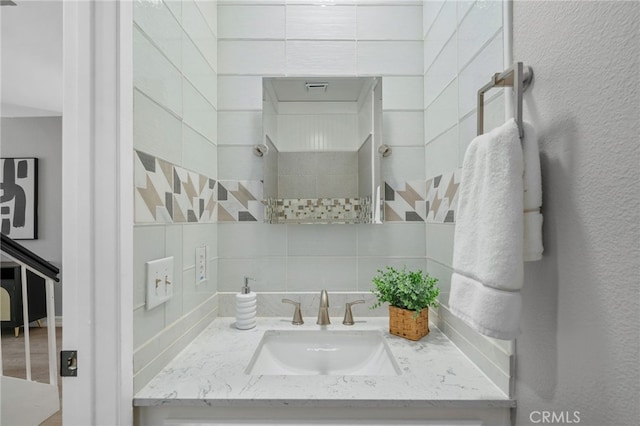 6923 Lamar Ct, Rancho Cucamonga, CA 91701 - bathroom featuring vanity and tasteful backsplash