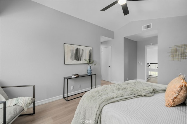 6923 Lamar Ct, Rancho Cucamonga, CA 91701 - bedroom featuring vaulted ceiling, light wood finished floors, and ceiling fan