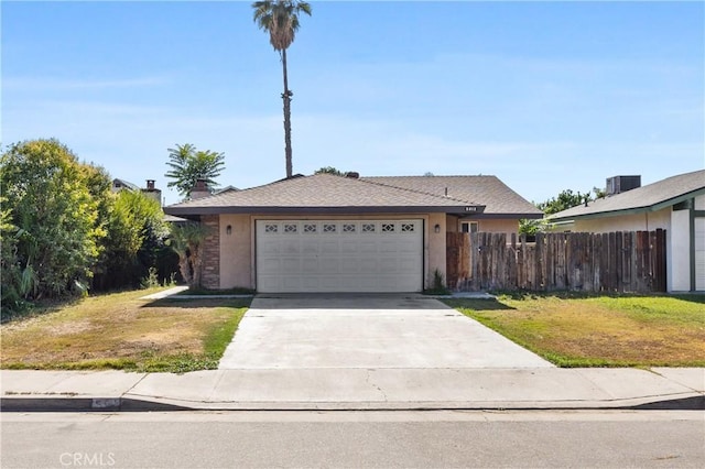 5013 Stancliff St, Bakersfield, CA 93307 - ranch-style home with an attached garage and concrete driveway