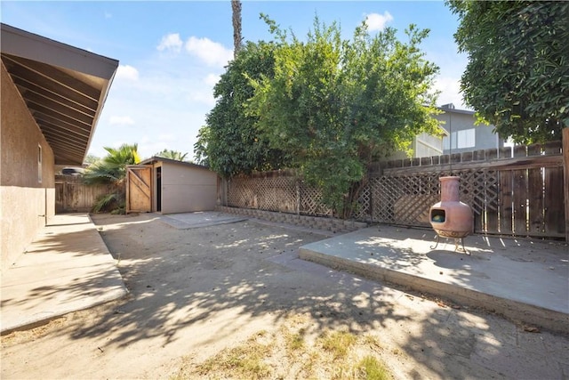5013 Stancliff St, Bakersfield, CA 93307 - fenced backyard featuring a patio and a shed
