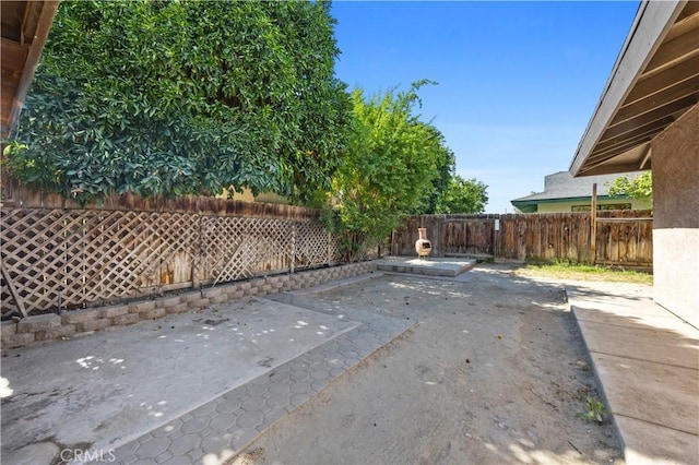 5013 Stancliff St, Bakersfield, CA 93307 - fenced backyard with a patio
