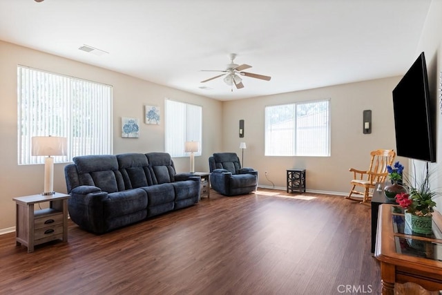 7704 Couples Way, Hemet, CA 92545 - living area with a ceiling fan and dark wood-style floors