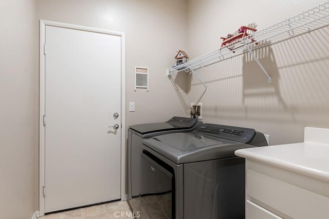 7704 Couples Way, Hemet, CA 92545 - laundry area with independent washer and dryer and light tile patterned floors