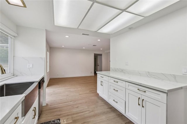740 Great Bend Dr, Diamond Bar, CA 91765 - kitchen featuring healthy amount of natural light, white cabinets, light wood-style floors, light stone counters, and recessed lighting