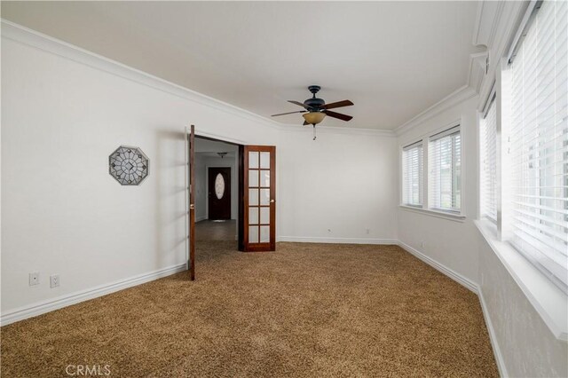 30221 Lands End Pl, Canyon Lake, CA 92587 - empty room featuring a ceiling fan, carpet flooring, ornamental molding, and french doors