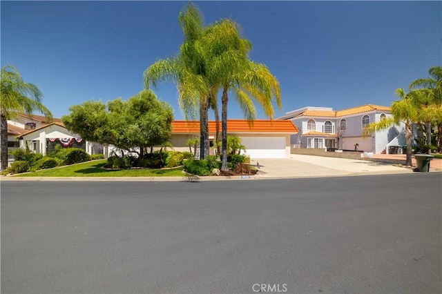 30221 Lands End Pl, Canyon Lake, CA 92587 - view of front of house with driveway and an attached garage