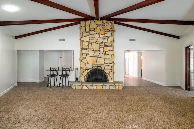 30221 Lands End Pl, Canyon Lake, CA 92587 - living room featuring high vaulted ceiling, carpet, beamed ceiling, and a stone fireplace