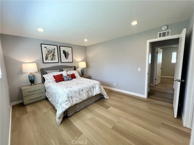 1626 S Pacific Ave, Santa Ana, CA 92704 - bedroom with light wood-style flooring and recessed lighting