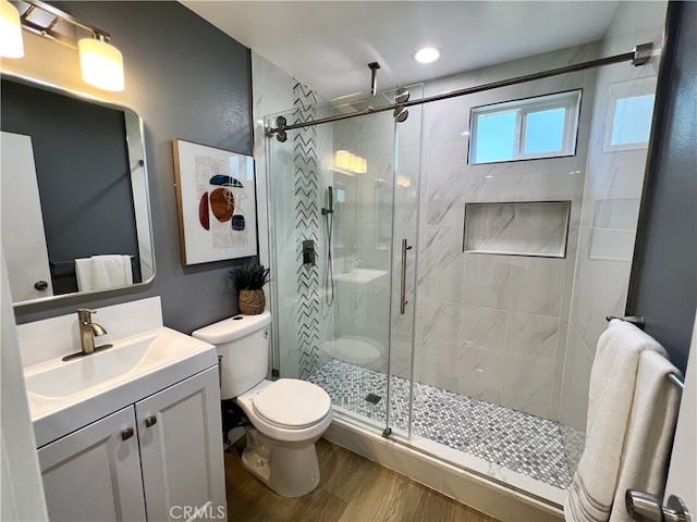 1626 S Pacific Ave, Santa Ana, CA 92704 - bathroom with vanity, a stall shower, and wood finished floors