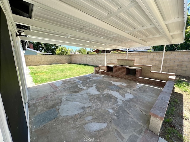 1626 S Pacific Ave, Santa Ana, CA 92704 - fenced backyard with a patio