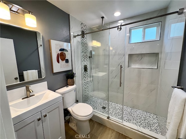 1626 S Pacific Ave, Santa Ana, CA 92704 - bathroom featuring vanity, a stall shower, and wood finished floors