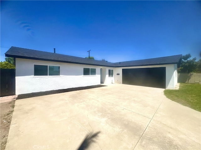 1626 S Pacific Ave, Santa Ana, CA 92704 - ranch-style home featuring an attached garage, stucco siding, and driveway