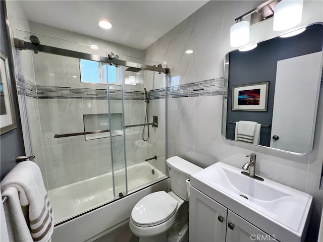 1626 S Pacific Ave, Santa Ana, CA 92704 - full bath featuring tile walls, bath / shower combo with glass door, and vanity