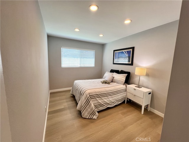 1626 S Pacific Ave, Santa Ana, CA 92704 - bedroom with light wood-type flooring and recessed lighting