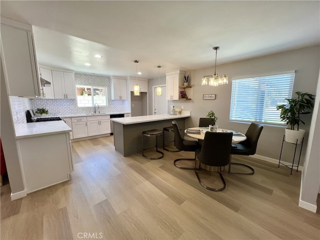 1626 S Pacific Ave, Santa Ana, CA 92704 - dining space with light wood finished floors, recessed lighting, and a chandelier
