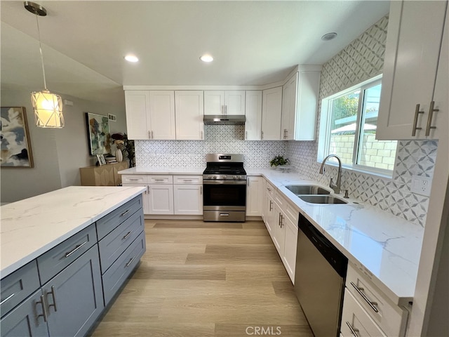 1626 S Pacific Ave, Santa Ana, CA 92704 - kitchen featuring appliances with stainless steel finishes, gray cabinetry, white cabinets, light stone countertops, and recessed lighting