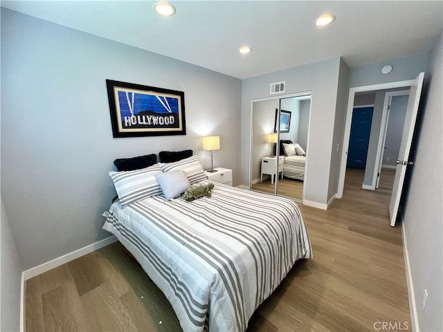1626 S Pacific Ave, Santa Ana, CA 92704 - bedroom with light wood finished floors, a closet, and recessed lighting