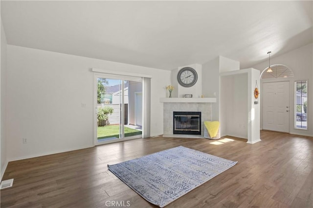 20197 Canyon View Dr, Canyon Country, CA 91351 - unfurnished living room featuring wood finished floors and a fireplace