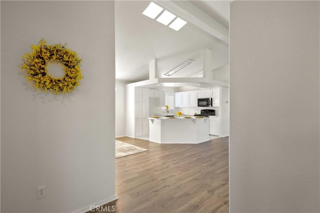 20197 Canyon View Dr, Canyon Country, CA 91351 - unfurnished living room with high vaulted ceiling and wood finished floors