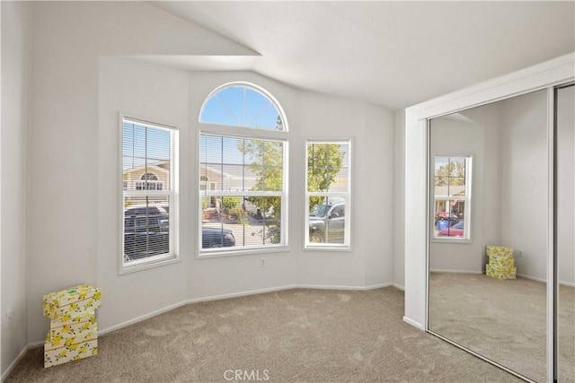 20197 Canyon View Dr, Canyon Country, CA 91351 - unfurnished bedroom featuring a closet, carpet, and lofted ceiling