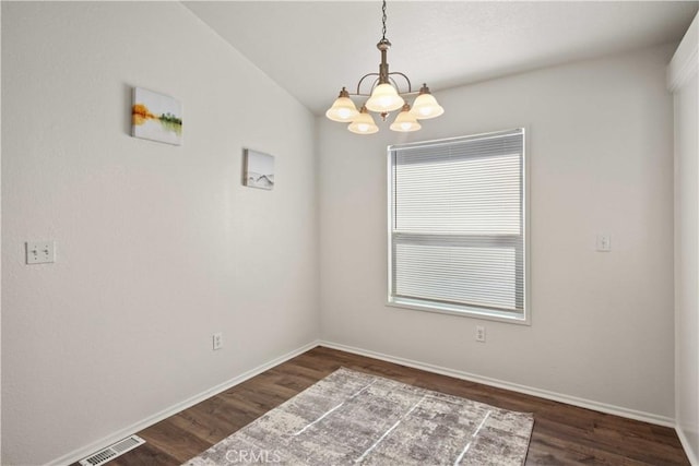 20197 Canyon View Dr, Canyon Country, CA 91351 - spare room with a chandelier and dark wood finished floors