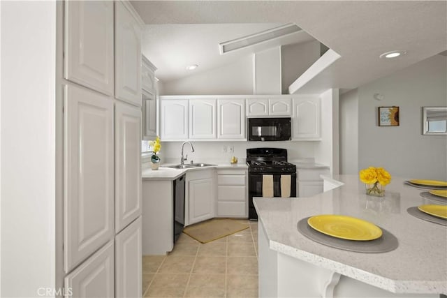 20197 Canyon View Dr, Canyon Country, CA 91351 - kitchen featuring black appliances, white cabinets, light tile patterned floors, lofted ceiling, and recessed lighting