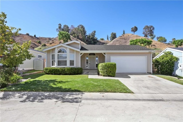 20197 Canyon View Dr, Canyon Country, CA 91351 - single story home featuring a garage, concrete driveway, a front yard, and covered porch