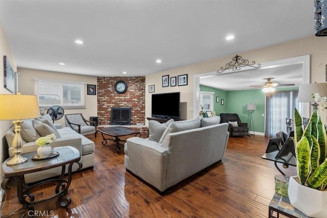 10143 Fremont Ave, Montclair, CA 91763 - living area featuring a fireplace, dark wood-style flooring, a ceiling fan, and recessed lighting