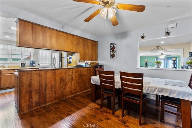 10143 Fremont Ave, Montclair, CA 91763 - dining space featuring ceiling fan and wood-type flooring