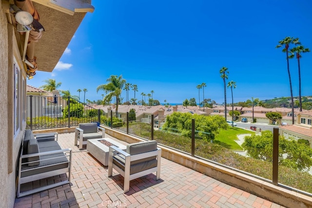 23851 Catamaran Way Unit 1, Laguna Niguel, CA 92677 - view of patio featuring a residential view and an outdoor living space with a fire pit
