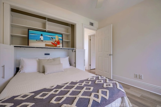 23851 Catamaran Way Unit 1, Laguna Niguel, CA 92677 - bedroom with wood finished floors and baseboards