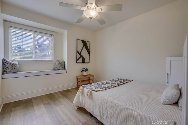 23851 Catamaran Way Unit 1, Laguna Niguel, CA 92677 - bedroom with wood finished floors and a ceiling fan