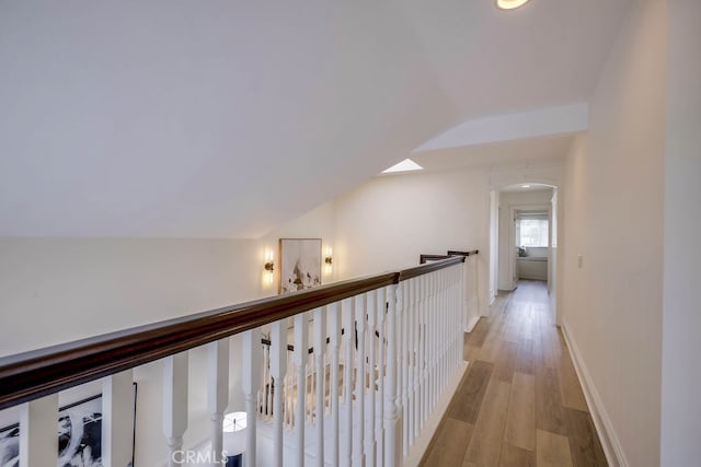 23851 Catamaran Way Unit 1, Laguna Niguel, CA 92677 - hall featuring arched walkways, light wood-style flooring, and recessed lighting