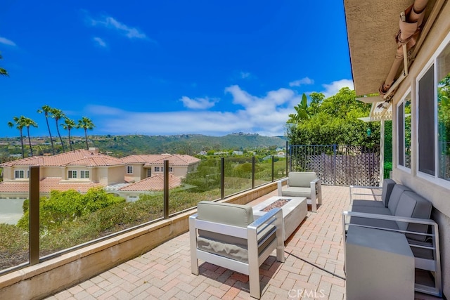 23851 Catamaran Way Unit 1, Laguna Niguel, CA 92677 - view of patio / terrace featuring an outdoor living space with a fire pit and a mountain view