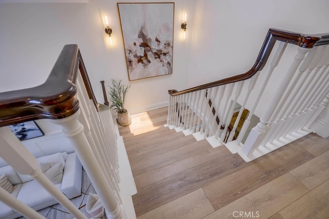 23851 Catamaran Way Unit 1, Laguna Niguel, CA 92677 - staircase featuring wood finished floors