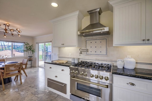 23851 Catamaran Way Unit 1, Laguna Niguel, CA 92677 - kitchen with wall chimney exhaust hood, stainless steel stove, a warming drawer, decorative backsplash, and white cabinets