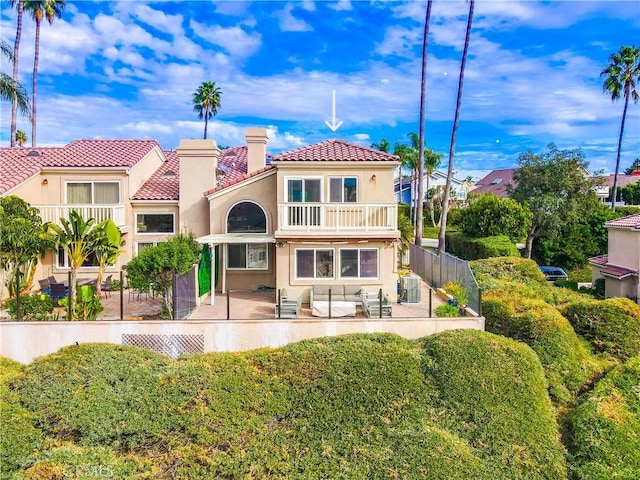 23851 Catamaran Way Unit 1, Laguna Niguel, CA 92677 - back of house featuring a balcony, stucco siding, a patio, and a tiled roof