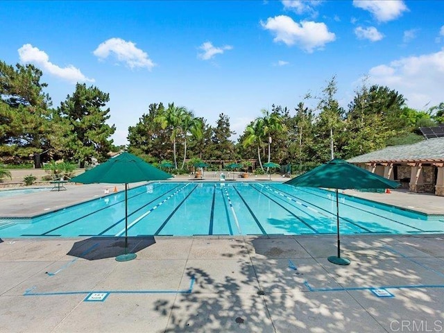 2381 Avenida Helecho, Carlsbad, CA 92009 - community pool with a patio and view of scattered trees