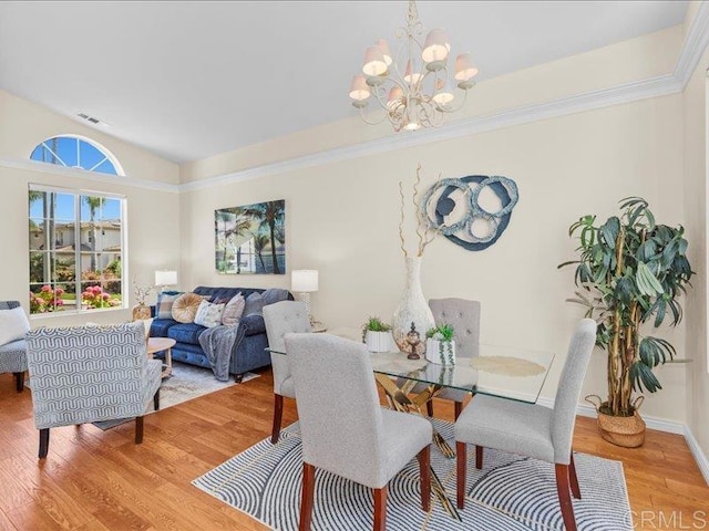 2381 Avenida Helecho, Carlsbad, CA 92009 - dining space with a chandelier and light wood finished floors