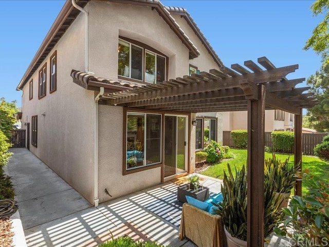 2381 Avenida Helecho, Carlsbad, CA 92009 - rear view of property featuring stucco siding, a pergola, and a patio area