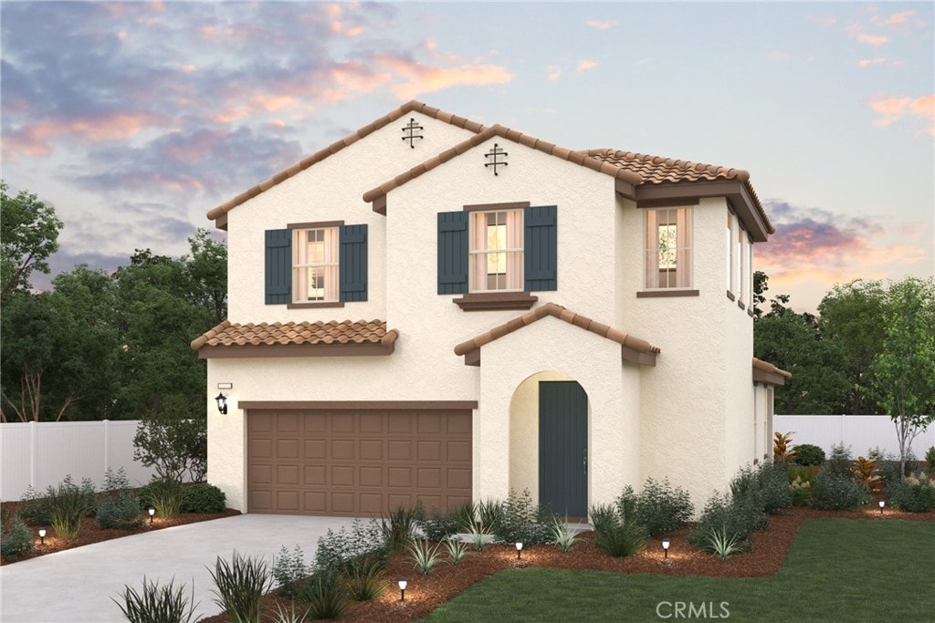 7184 Veranda Ln, Highland, CA 92346 - mediterranean / spanish-style home with a tile roof, a garage, concrete driveway, and stucco siding