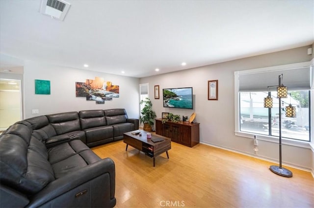 5963 Rio Valle Dr, Bonsall, CA 92003 - living room featuring light wood finished floors and recessed lighting