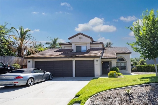 5963 Rio Valle Dr, Bonsall, CA 92003 - mediterranean / spanish house featuring a garage, stucco siding, driveway, and a tiled roof